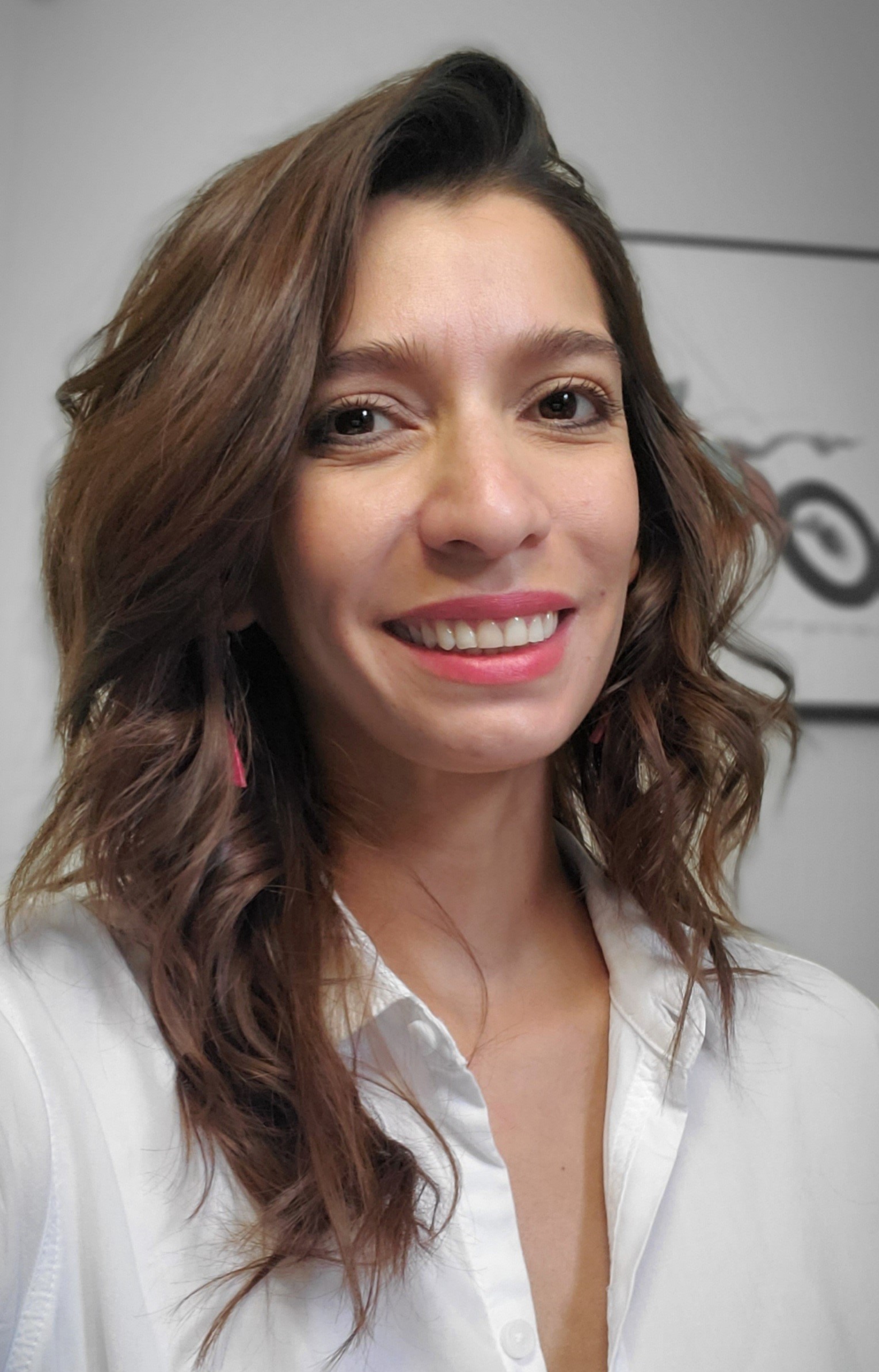 Julie photo (2) Photo of AT Specialist Julie LeJeunesse smiling wearing a white top